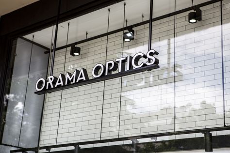 Sunglasses and eyewear store @oramaoptics Store Signage Design, Japandi Office Design, Mall Signage, Hanging Signage, Ballroom Design, Corporate Signs, Entrance Signage, Window Signage, Wayfinding Signage Design