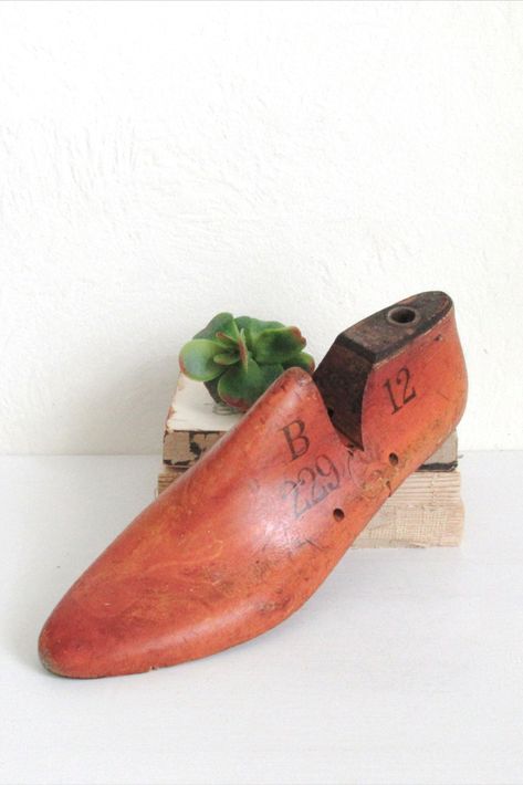 Lovely vintage wooden shoe form made by Woodright, perfect for farmhouse or vintage decor. With its size of 12" long x 3 3/4" wide x 4" tall, it would make a great statement piece on a shelf or tabletop. The shoe bears some unique markings, with "Woodright" and the year "1957" on one side, and "B 229 12" on the other side. These markings add to its historical charm and authenticity. Dad Might, Shoe Mold, Jamestown Ny, Shoe Molding, Wood Shoe, Wooden Shoe, Vintage Farmhouse Decor, Wood Shoes, Shoe Last