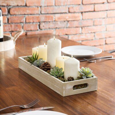 The set of 2 wood trays feature a square design and the narrow is ideal for candles or small planters. Perfect for serving food and drinks, these decorative trays feature cutout handles which allow for easy carrying and transportation from room to room. Its distressed rustic style complements a variety of home decors. The product can also be used as a decorative accent for your coffee table, kitchen, or ottoman. With a perfect size for hall tables or a crowded countertop, these rustic wood trays Dining Table Decor Centerpiece, Wood Serving Trays, White Serving Tray, Rustic Serving Trays, Table Centerpieces For Home, Wood Trays, Dining Room Centerpiece, Dining Room Table Centerpieces, Coffee Table Centerpieces