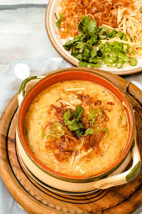 Haleem is nutritious whole grain meal, with goodness of grains, lentils and meat. It tastes best with an array of garnish and chat masala. Chicken Haleem Recipe, Haleem Recipe, Chicken Porridge, Mains Recipes, Halal Chicken, Eid Recipes, Ramadan Ideas, Pakistani Dishes, Pakistani Recipes