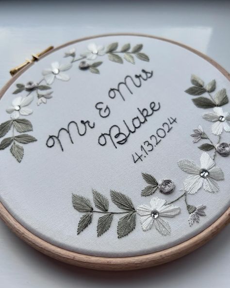 Wedding or Anniversary Floral Embroidery, personalised with names and date 🤍 . . #name #nameanddate #specialdate #handsewn #handembroidery #sarahcuthbertembroidery #weddinggift #anniversarygift #personalisedgifts #floral #textiledesign #handmade #ukhandmadegifts #springwedding Hoop Art Wedding, Anniversary Embroidery, Flower Hand Embroidery, Art Wedding Gift, Instagram Wedding, 2024 Wedding, Couple Items, Embroidery Hoop Art, Personalised Wedding