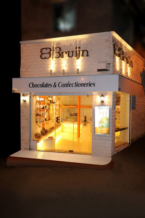 Bruijn chocolate store by Kaleido architecture, Mumbai store design Cake Store Design, Shop Exterior Store Fronts, Store Fronts Ideas, Exterior Store Fronts, Chocolate Shop Design, Stretch Lab, Chocolate Store Design, Heaven Artwork, Baking Room