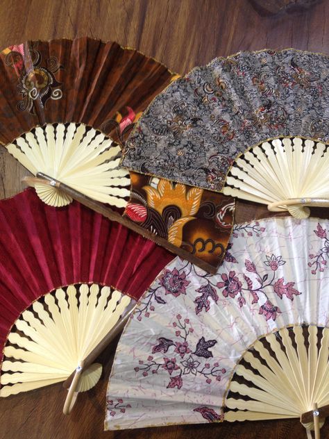 Beautiful Balinese hand fans, we have ten different prints at our 17th avenue location. #yyc #imports #bali #handfans Hand Fan Aesthetic, Hand Fans, Aesthetic Things, Balinese, Hand Fan, Batik, Visual Art, Bali, Textiles