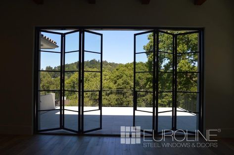 Custom Exterior Steel Bifold Doors | Euroline Steel Windows Townhouse Patio, Metal Door Frame, Folding Doors Exterior, Sliding Door Window Treatments, Steel Frame Doors, Steel Doors And Windows, Door Picture, Doors Exterior, Victorian Kitchen