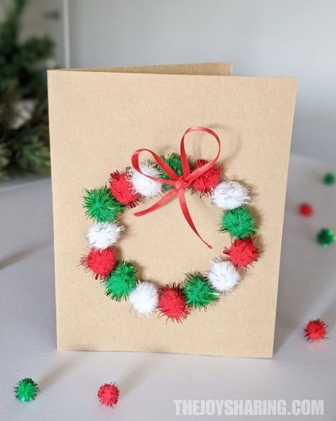 Pom Pom Wreath Christmas Card #thejoyofsharing #christmascard #diychristmascard #kidscrafts #christmascrafts #preschoolcrafts #artsancrafts