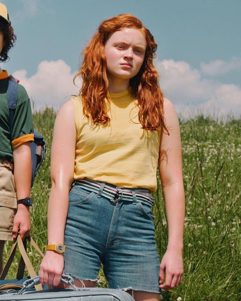 Image may contain: 1 person, standing, sky, cloud, outdoor and nature Stranger Things Sadie Sink, 60 Outfits, Stranger Things Outfit, Tomboy Look, Stranger Things Max, Max Mayfield, Stranger Things Season 3, Famous Outfits, Stranger Things 3