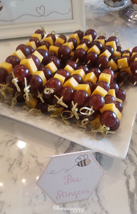 Bee Inspired Party Food, Bee Stingers Fruit, Bee Bridal Shower Theme Food, First Bee Day Party Food Ideas, Bridal Shower Honey Bee Theme, Honey Bee Gender Reveal Food, Honey Themed Party Decor, Honey Bee Baby Shower Food Ideas, What Will It Bee Gender Reveal Food