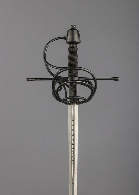 Rapier | hilt, German; blade, Spanish | The Metropolitan Museum of Art Dnd Rapier Design, Pirate Rapier, Rapier Design Dnd, Musketeer Rapier, Pirate Bard, Spanish Rapier, Dark Knight, Metropolitan Museum Of Art, Metropolitan Museum