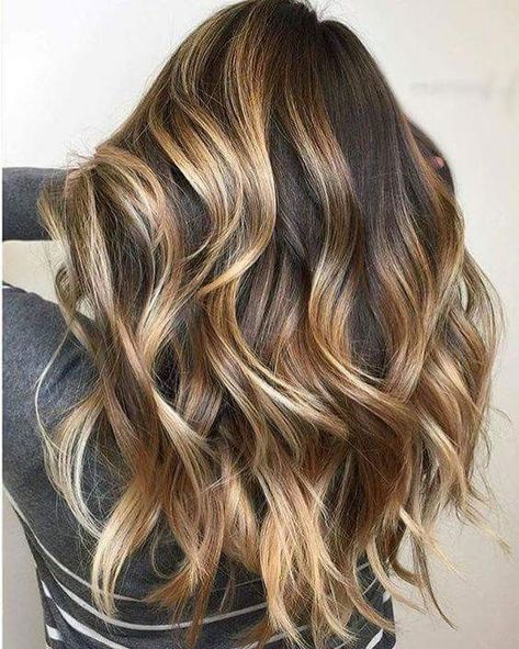 Brown hair with blonde highlights lets you have the best of both worlds with its rich foundation of brown and sun-kissed touches of blonde. Whether your hair is chestnut, ashy, caramel, or honey brown these blonde highlight ideas will take your hair to the next level. #brownhairwithblondehighlights #blondehighlightideas #beautytip #haircolorideas #southernliving Blond Rose, Long Sleek Hair, Chestnut Brown Hair, Rambut Brunette, Bob Hairstyles For Thick, Short Brown Hair, Brown Hair With Blonde Highlights, Caramel Highlights, Long Brown Hair