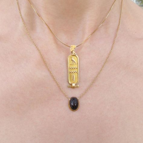 The Egyptian neck theme never gets old. 🏺#scarab #cartouche #egyptian #necklace #lovegold #charm #neckparty #thegemhunter Ankh Jewelry, Egyptian Cartouche, Cartouche Necklace, Gold Jewelry Prom, Kemetic Spirituality, Egyptian Necklace, Delicate Gold Jewelry, Gold Jewelry Outfits, Jewelry Board