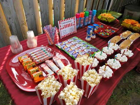 "Concession Stand" Backyard Drive-in Birthday Party www.TheWeddingPlanners.ca Outdoor Movie Birthday, Movie Theatre Birthday Party, Backyard Movie Night Party, Movie Theater Party, Outdoor Movie Party, Backyard Movie Party, Outdoor Movie Night, Movie Night Food, Movie Night Birthday Party