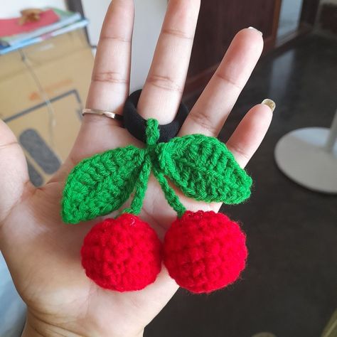 Crochet cherry rubber band🍒🍒 Crochet Rubber Bands, Rubber Band Hairstyles For Kids, Rubber Band Hairstyle, Band Hairstyles, Crochet Cherry, Rubber Band Hairstyles, Gauntlet Gloves, Tutorial Ideas, Hair Rubber Bands