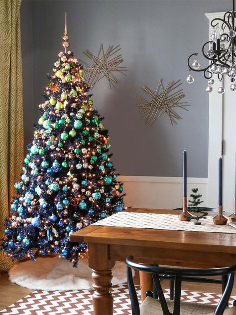 Supercool, Colorful and Unique Christmas Tree Looks We Love | HGTV Bauble Garland, Ombre Christmas Tree, Maximalist Christmas, Christmas Tree Inspo, Rainbow Christmas Tree, Blue Trees, Apartment Christmas, White House Christmas, Rainbow Christmas