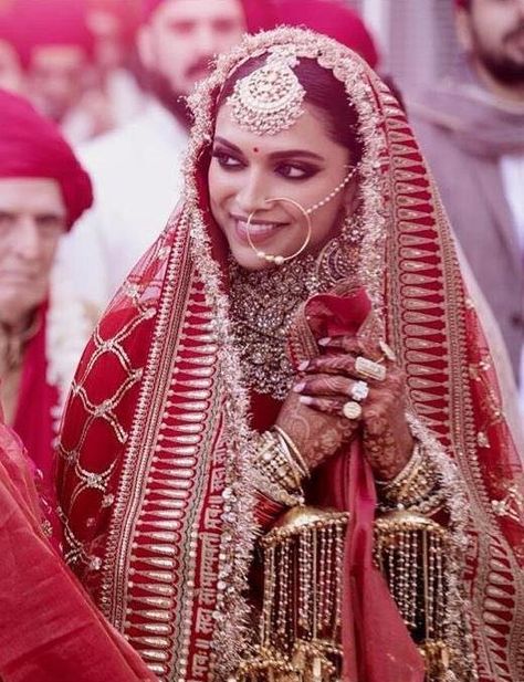 This bridal portrait of Deepika Padukone is giving all the brides out there some major goals! #shaadisaga #bridalportrait #bridalphotography #deepikapadukone #bridegoals #bridalgoals #weddinginspo #photoideas #teambride #brideinspiration #bride #bridal #beautifulbride Deepika Padukone Lehenga, भारतीय दुल्हन संबंधी, Indian Lengha, शादी की तस्वीरें, Deepika Ranveer, Palace Wedding, Wedding Shopping, Bridal Mehendi, Arjun Kapoor