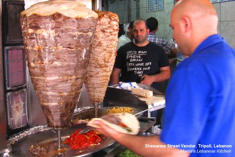 What is Shawarma  Shawarma is probably one of the most recognizable Middle Eastern ethnic food names in the West, behind Falafel and Hummus. The name comes from the Turkish word çevirme which means “turning,” and where you have some deeply marinated layers of beef, lamb or chicken stacked on a vertical spit and slowly turning  again Lebanese Beef Shawarma Recipe, Beef Shawarma Recipe, Beef Shawarma, Lebanese Garlic Sauce, Shawarma Recipe, Lebanese Cuisine, Lebanese Food, Doner Kebab, Marinated Beef