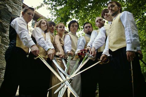 Tyler wants a groomsmen's photo like this Groomsmen With Swords, Fantasy Groomsmen, Medieval Wedding Groom Outfit, Hobbit Groomsmen, Wedding With Swords, Fantasy Wedding Groom, Viking Groom, Httyd Wedding, Wedding Swords