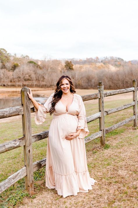 Outdoor maternity session by a fence. Mom is dressed in a long gold dress and smiling. Maternity Photography Ideas Plus Size, Plus Size Maternity Photoshoot, Pregnancy Photos Plus Size, Maternity Pictures Plus Size, Maternity Shoot Plus Size, Maternity Photos Plus Size, Modest Maternity Photos, Maternity Photography Plus Size, Plus Size Maternity Photography