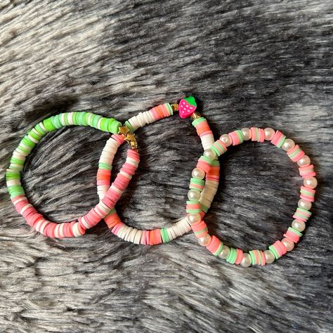 New Strawberry Stack For Sale! This Stack Comes With 3 Different Bracelets, They All Have The Same Color Scheme Of Light Pink, Light Green And White! These Bracelets Are Lighter In Real Lighting. #Homemadebracelets #Bracelets #Newbracelets #Claybeadbracelets #Braceletstock #Smallbusiness #Newbracelets #Beutifulbracelets #Smallbuisnessbracelets #Prettybracelets #Braceletsforsale #Newbracelets Silver Braided Bracelet, Guitar String Bracelet, Homemade Bracelets, Jewelry Clay, Wrist Stacks, Expandable Bangle Bracelet, Artisan Bracelets, Pink Strawberry, Coin Bracelet