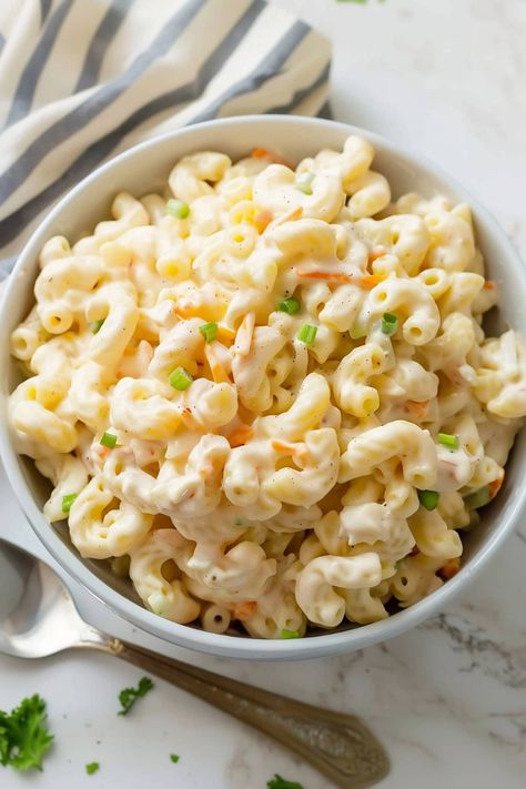 This Hawaiian macaroni salad is a fun twist on a classic! The tropical flavor is perfect for any potluck. Pineapple Macaroni Salad, Hawaiian Plate Lunch, Hawaiian Macaroni Salad, Slaw Dressing, Hawaiian Recipes, Kalua Pork, Macaroni Salad Recipe, Plate Lunch, Hawaiian Food