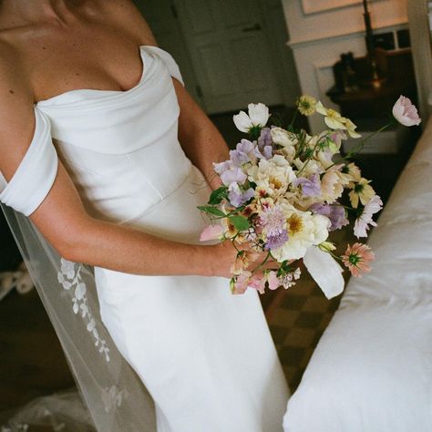 Georgia’s bouquet ✨🤍 Captured so beautifully by @theshannons.photography. I don’t think I’ll ever get over this wedding & the dreamy colour palette. Featuring Margaret Merrill & Vintage Silk roses, Cosmos, Scabiosa, Californian Poppies, Sweet Peas, Phlox and a few very pale pink Dahlia. All British stems sourced from @hortuspoeticus, @marlston_farmgirl & @rosebiemortonflowerstrade 🫶🏼 The perfect silk ribbons @northern_hands 🎀 Phlox Bouquet, Californian Poppies, Sweet Pea Bouquet, Dreamy Bride, Pink Dahlia, Flower Inspiration, Wedding Flower Inspiration, Sweet Peas, Silk Roses