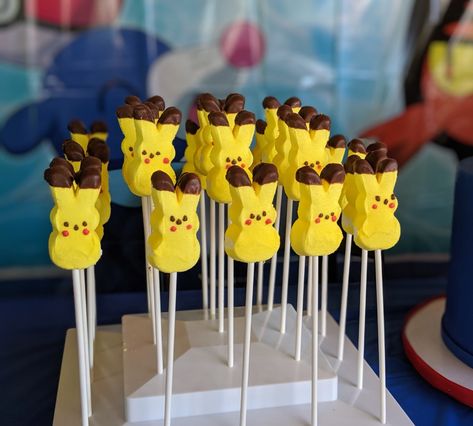 Chocolate Dipped Peeps with Red Cookie Icing. For a Pokémon Birthday. Pokemon Dessert Table, Pokemon Peeps, Pokemon Treats, Pokemon Desserts, Pokemon Cookies, Bunny Ears Template, Bunco Ideas, Pokemon Themed Party, Pokémon Birthday