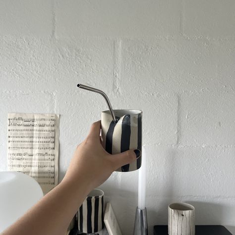 Elevate your iced coffee routine with this eco-friendly ceramic takeaway cup, infusing cozy vibes into your experience. Food safe. It is suitable for dishwashers, but hand washing is recommended. Straw is not included. Handmade ceramic takeaway cup, crafted from recycled stoneware clay fired in Naarm Melbourne, Australia. *note each piece is unique due to being handmade & painted. some pieces may have very minor imperfections* Pottery Coffee Cups Handmade, Ceramic Sippy Cup, Aesthetic Pottery, Keep Cup, Minimal Monochrome, Monochrome Aesthetic, Pottery Inspo, Clay Cup, Handmade Paint