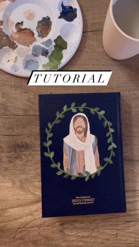 Due to popular request, here’s the Jesus painting tutorial!! One of my all-time FAVORITES since He is what the Book of Mormon is all about! | Instagram Decorate Book Of Mormon, Painting The Book Of Mormon, Book Of Mormon Drawings, Decorate Book Of Mormon Cover, How To Paint Book Of Mormon Cover, Paint A Book Of Mormon, Paint Book Of Mormon Cover Ideas, Decorated Book Of Mormon Cover, Painting Books Of Mormon