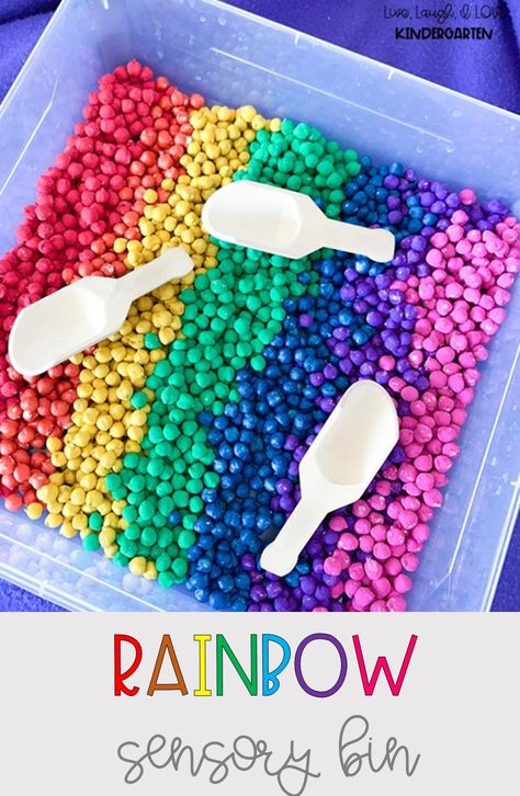 Create a rainbow sensory bin using chickpeas and paint! Learn how to dye chickpeas using paint! The Rainbow Fish Sensory Bin, Diy Colored Rice Sensory Play, Rainbow Sensory Bin, Rainbow Activities For Kids, Dyed Rice Sensory Bin, How To Color Rice For Sensory Bin, Rainbow Rice Sensory Bin Activities, Rainbow Sensory, Sensory Bin Ideas