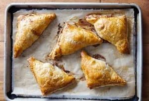 These impressive pear turnovers are made with a spice-infused pear compote that's encapsulated in tender, flaky puff pastry. A perfect autumn dessert. #pastry #pearturnover #puffpastry Pear Turnovers, Pear Compote, Pear Dessert, Turnover Recipes, Pear Recipes, Puff Pastry Recipes, Pastry Recipes, Breakfast Treats, Fall Desserts