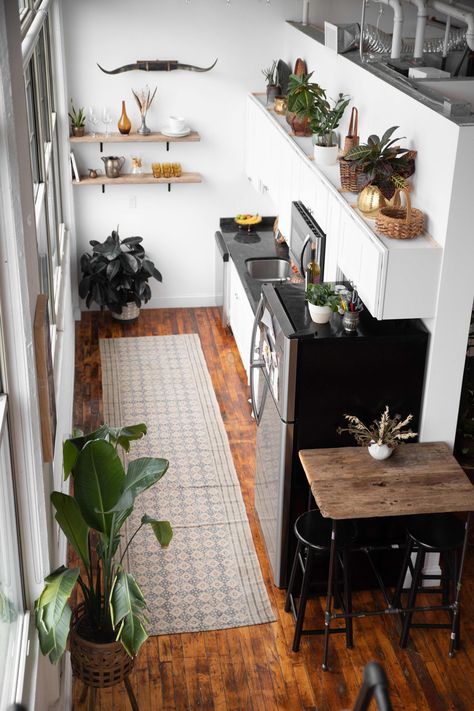 A Beautiful 600-Square-Foot Studio Was Furnished on a Small Budget | Apartment Therapy Narrow Open Kitchen And Living Room, Narrow Kitchen Renovation, Narrow Studio Apartment Ideas, Tiny Narrow Kitchen, Very Narrow Kitchen, Narrow Studio Apartment, Scandinavian Small Kitchen, Studio Apartment Kitchen Ideas, Small Narrow Kitchen