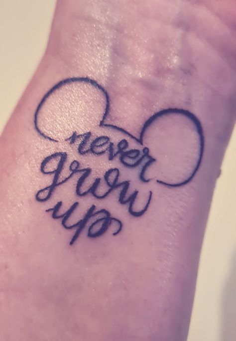 Discreet Disney Tattoos, Mom And Daughter Disney Tattoos, Disney Matching Tattoos Friends, Best Friend Disney Tattoos, Never Grow Up Tattoo, Minimalist Tattoo Disney, Disney Small Tattoo Ideas, Minimalist Disney Tattoo, Disney Foot Tattoo