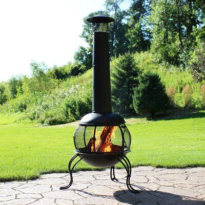 Alcott Hill Bring culture and warmth to the patio or backyard with this outdoor wood-burning chiminea fire pit by Alcott Hill. First utilized 400 years ago in Spain and Mexico, chimineas were a staple to every home. They were used for cooking, baking and heating. This chiminea features a durable steel construction with a high-temperature black paint finish so it is sure to last through many seasons. Chiminea Fire Pit, Rain Cap, Metal Fire Pit, Wood Fire Pit, Fire Pit Bowl, Wood Burning Fire Pit, Wood Burning Fires, Modern Backyard, Steel Wood