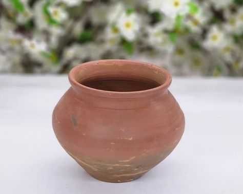 "Organic Clay Pot Earthen Clay Pot Dahi Handi Hand Made Curd Cooking Clay Pot Terracotta Small Yogurt Pots Earthen Mud Serving Bowls >> Featured Refinements : Clay Cooking Pot >> Product Type : Kitchenware >> Use For : Kitchen >> Material : Clay >> Dimension ( H x W x D ) : 4.5 x 6 x 6 inch >> Theme : Art >> Weight : 1.14 Lb - Earthenware cooking clay utensils are a perfect choice for Moroccan healthy recipes. People have been cooking tasty meals with such handmade terracotta casserole cooking c Clay Cooking Pot, Dahi Handi, Handmade Clay Pots, Party Cooking, Silicone Coasters, Wooden Spatula, Pot Designs, Clay Pot, Terracotta Pots