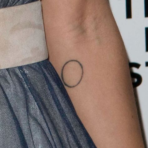 Zoë Kravitz Circle Forearm Tattoo | Steal Her Style Circular Tattoo Placement, Round Tattoo Placement, Circle Tattoo Placement, Geometric Circle Tattoo, Zoe Kravitz Tattoos, Circle Tattoo Meaning, Enso Tattoo, Tattoo Circle, Circular Tattoo