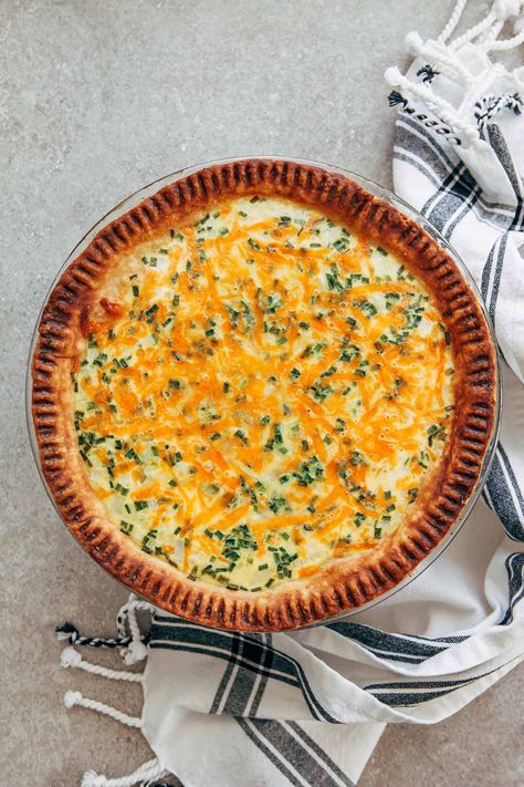 Buttermilk Quiche with Ham, Cheddar, And Chives | kellyneil.com - Buttermilk quiche is a classic French egg custard tart kicked up a notch with the tang and zip of creamy buttermilk! Homemade flaky pastry seals the deal. #buttermilkquiche #buttermilkquicherecipes #quichewithbuttermilk #hamandcheddarquiche Buttermilk Quiche Recipes, Buttermilk Quiche, Buttermilk Homemade, Quiche With Ham, Recipes Using Buttermilk, Ham Quiche Recipe, Egg Custard Tart, Lettuce Celebrate, Ham Quiche