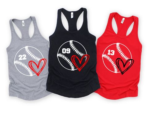 Baseball Tank with Personalized Players Number. Tank Top in Your choice of Color.  This Next Level Brand Tank Top is sure to be a Summer favorite.    Please review size chart prior to placing your order.  This is women's fit cut tank top so if you prefer a looser fit, please size up a size.  TO ORDER: Choose Tank Color Choose Size Choose Baseball/Number Color: Black or White Choose Heart Color: Red, Black or Other Color Check Out MATERIAL & FIT  60% combed ringspun cotton/40% polyester lightweig Softball Tshirts, Baseball Mom Tank Top, Softball Team Shirt, Baseball Cricut, Baseball Tank, Baseball Shirt Designs, Baseball Numbers, Baseball Tanks, Baseball Girlfriend