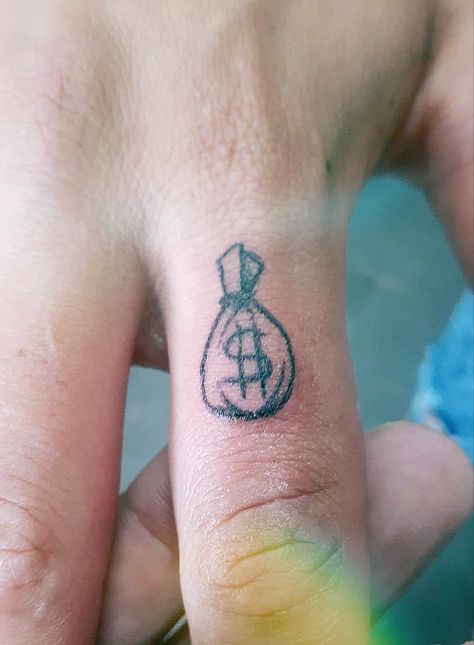 Pics edited by AirBrush App. minimalist tattoo of money Ideas. #money #airbrush #retouch #photoeditor #filter #minimalist #minimal #minimalisttattoos Burning Money Tattoo, Money Hungry Tattoo, Money Sign Tattoo, Money Tattoos, Money Bag Tattoo, Meaningful Tattoos For Men, Money Tattoo, Small Meaningful Tattoos, Airbrush App