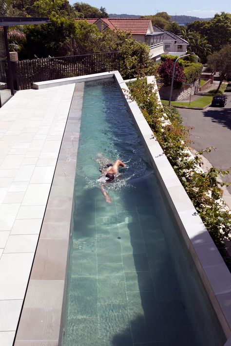 Completed in 2012, the Kharkov project on Beresford Road, Bellevue Hill involved substantial alterations to the house built in 1911, with spectacular view over Rose Bay and Sydney Harbour. Collins and Turner’s work includes the design of all aspects of the external works, including excavation and reconstruction of a sandstone rockwall to incorporate a new glazed passenger lift; reconstruction of the garage and a new entry tunnel cut into existing rock; construction of a new suspended 18m lap... Lap Pools, Kleiner Pool Design, Swimming In The Pool, Apartment Designs, Small Swimming Pools, Small Pool Design, Real Estat, House Luxury, Small Pools