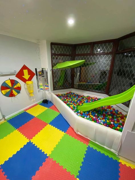 Dad transforms his dated living room into an incredible soft playroom for his son complete with a ball pit and slide Diy Soft Play Area, Soft Playroom, Ball Pit Ideas, Toys Cabinet, Playroom Slide, Sensory Kids Room, Sensory Playroom, Ball Pit With Slide, Kids Playroom Ideas Diy