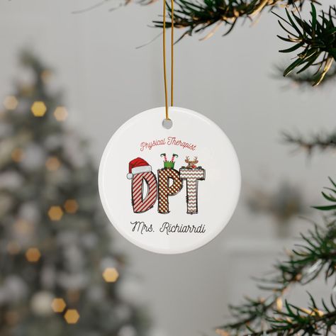 Hey, are you in search of a unique Christmas ornament that also doubles as a thoughtful gift for a clinical fellow or a physical therapist who has recently graduated? Well, look no further because our DPT Christmas ornament is just what you need! This meticulously crafted ornament is the ideal way to show appreciation to a PT teacher, occupational therapist, physical assistant, or physiotherapist. Whether you're celebrating the achievements of a doctor of physical therapy, a pediatric PT, or anyone in the field, this ornament is the perfect sentimental touch. Let this ornament symbolize the hard work and dedication put into the world of physical therapy. It's more than just a decoration; it's a heartfelt gesture filled with meaning. Make this Christmas special with our DPT Christmas orname Physical Therapy Graduation, Pediatric Pt, Doctor Of Physical Therapy, Therapy Gift, Unique Christmas Ornaments, Show Appreciation, Occupational Therapist, Physical Therapist, Hard Work And Dedication