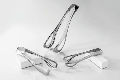 Grove Tongs are designed to float and look dynamic in appearance on the buffet/kitchen table surface, giving an architectural feel through the singular arced radius on the underneath of the handle. The end of the handle is one, inclined spring radius, the incline making the handle extremely comfortable in the palm of the users’ hand. Studio William Welch Ltd was awarded Special Mention in the German Design Awards 2021. Buffet Kitchen, Luxury Cutlery, Cutlery Design, Serving Tongs, Cutlery Sets, German Design, Design Language, Serving Set, Design Museum