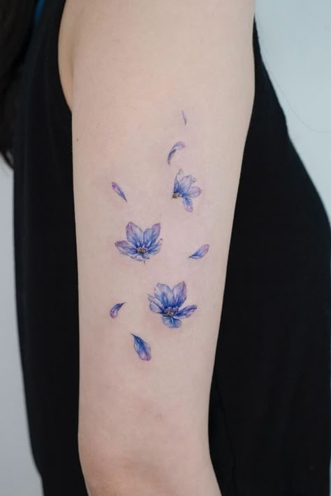 Flying Flowers Tattoo, Blue Daisy Tattoo, Small Blue Tattoo, Blue Flowers Tattoo, Dark Blue Tattoo, Blue Flower Tattoo, Blue Flower Tattoos, Blue Ink Tattoos, Flower Tattoo On Ribs