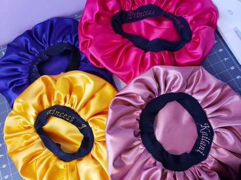 Personalized embroidered satin bonnets! Custom to each loved one, super comfortable, and gentle on your hair. Silk Hair Bonnets, Satin Bonnets, Neon Acrylic Nails, Diy Hair Scrunchies, African Women Art, Satin Bonnet, Fashion Top Outfits, Hair Bonnet, Silk Hair