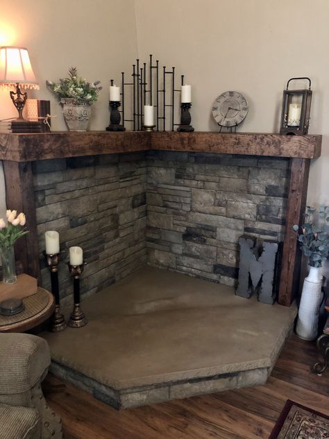 Manufactured Home Wood Stove, Rock Behind Wood Stove, Mantle Over Pellet Stove, Wood Stove Area Ideas, Corner Stone Hearth For Wood Stove, Wood Burning Fire Places Ideas, Corner Stove Fireplace Ideas, Pellet Stove Platform, Living Room With Stove Fireplace