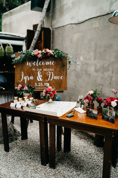 Elegant welcome table featuring romantic red blooms and gold accents  | Image by The Times We Have Wedding Welcome Table Decor, Registration Table, Wedding Welcome Table, Creative Seating, Activities For Wedding, Welcome Table, Tulum Wedding, Unique Wedding Flowers, Rustic Wedding Inspiration