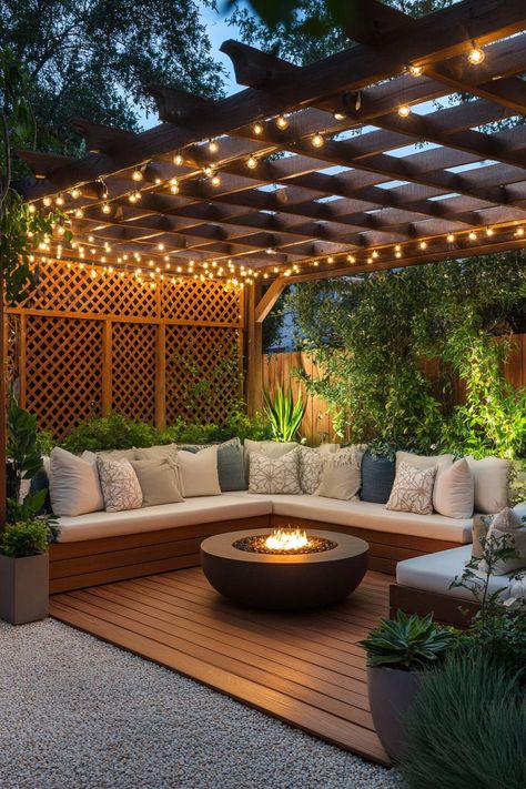 Outdoor seating area with twinkling lights and a central fire pit. An outdoor living room is where nature and luxury collide, turning your backyard into the ultimate spot for lounging, laughing, and living it up. Outside Sitting Area Ideas, Twinkle Lights Backyard, Cream Colored Sofa, Plush Lounge Chair, Cabin Modern, Outdoor Seating Area, Round Fire Pit, Outdoor Paradise, Outdoor Living Rooms