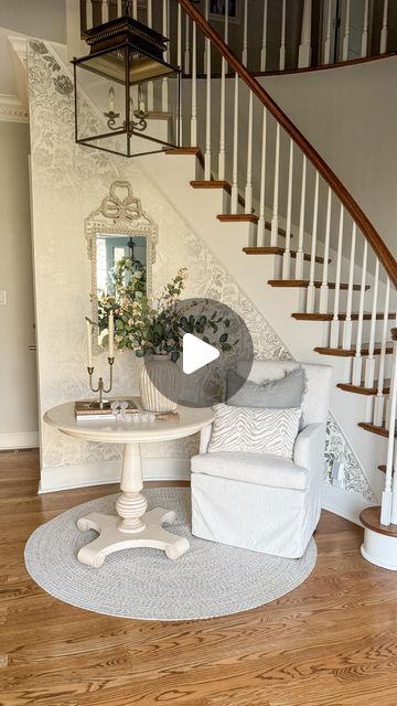 Jenny Brooks • Bloom Interior Designs on Instagram: "Did you notice?! 👀 First, how NOT graceful I looked moving that heavy table and second, me fighting with the stems that were all tangled! 😆 But I love this little refresh of my foyer. Comment SHOP and I’ll send you the links. Next up for this space…new wallpaper! 🙌✨ Have you been refreshing any spaces in your home? Like • Comment • Save • Share #foyerdesign #foyerdecor #entrywaytable #entrywaydesign #ltkhome #cottagestyle #antiquedecor #staircasedesign #southernhome #cottagecoreaesthetic Entryway design, Cottage style, Foyer inspo, woods and whites, staircase ideas, foyer table" French Country Foyer, French Entryway, Entryway Renovation, Entryway Design, Staircase Ideas, Foyer Table, Foyer Decor, Foyer Design, Entry Way Design