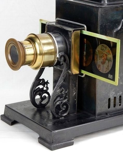 Ernst Plank magic lantern projector with three glass slides. Good condition for age. https://www.catawiki.com/en/l/65445585 #camera #photography #buyfilmnotpixels #analogue #collectingcameras #vintage #1890s #shootfilm #filmcamera #vintagecamera #projector #magiglantern #ernstplank #ernstplankmagiclantern #victorianage #victorian #cameraoftheday #filmisnotdead #lomography #bokeh #exclusive #exclusiveCamera #catawiki #catawikicameras Magic Lantern Projector, Mansion Rooms, Slide Projector, Film Projector, Magic Lantern Slides, Magic Lantern, Shoot Film, Vintage Cameras, Haunted Mansion