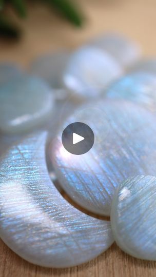 7.3K views · 896 reactions | Making faux rainbow moonstone with polymer clay, nail chrome powder and resin…

If anyone saw my stories a couple of weeks ago you’ll have had a sneaky peek of some shiny loveliness already ✨ Here’s a little run through how I made these moonstone-esque pieces. You’ll only need a tiny smudge or two of blue - don’t overdo it! Less is more (something I struggle with when making 😂) then you can go to town with the shimmery nail powders. I only used the blues and a touch of gold for these but have a play about, more colours can make some gorgeous Opal effects too 👍

Remember to save for later and happy crafting my lovelies 😘

#fauxrainbowmoonstone #polymerclaymoonstone #polymerclayfauxstones #polymerclaytutorials #shinyforever #polymerclayandresin #addictedtopoly Faux Opal Polymer Clay, Nail Chrome Powder, Nail Chrome, Liquid Polymer Clay, Clay Techniques, Homemade Clay, Clay Works, Diy Earrings Polymer Clay, Clay Stuff