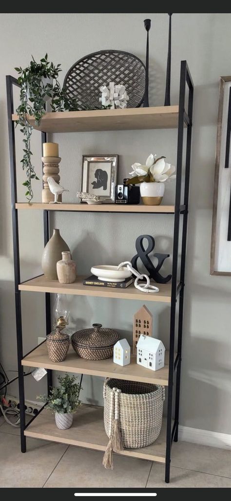 Shelf Stand Decor, Bookshelf Inspo Living Room, Ladder Style Bookshelf, Standing Shelf Decor Living Room, Tiered Shelf Decor Living Rooms, Ladder Shelf Styling Living Room, Vertical Book Shelf Ideas, Tall Shelf Decor Living Room, Metal Shelf Decor Living Room